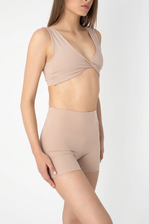 Vücudu saran esnek yapısı, yoga, pilates, fitness gibi aktivitelerde özgürce hareket etmenize olanak tanır. Şık ve minimalist tasarımıyla öne çıkan Comfortlux Bej Crop, zarif rengiyle her stile kolayca uyum sağlar.